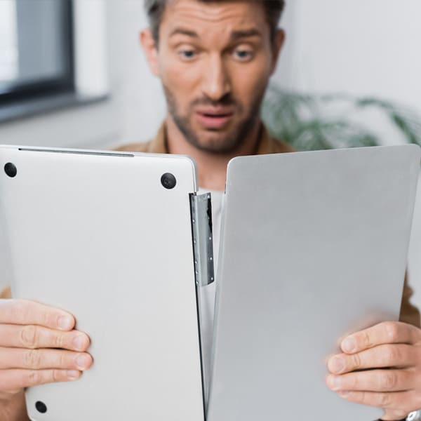 Shaking or tilting a MacBook vigorously after water spill