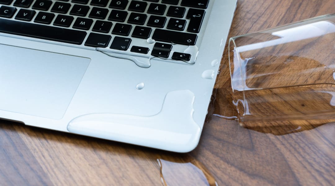 Avoid these 6 common mistakes after a spilled water on your MacBook