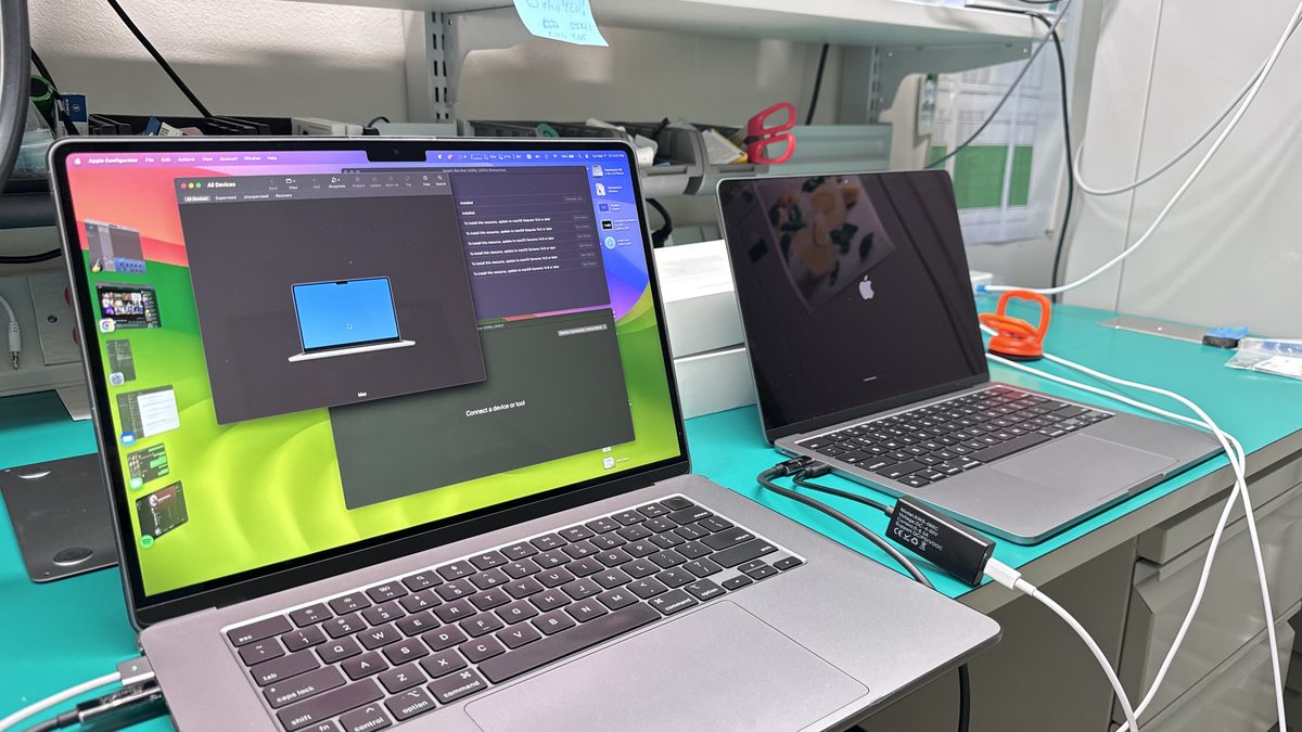 WarriorMac repair bench showing Apple Configurator diagnostics running on a MacBook during evaluation