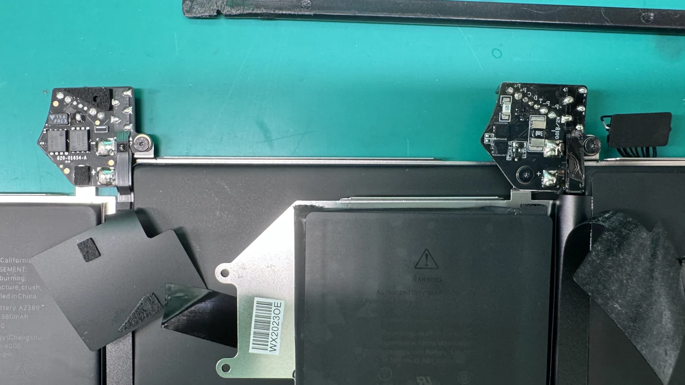 Side by side comparison of a genuine Apple battery controller board on the left and a counterfeit controller on the right