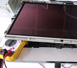 Apple iMac repair service with multimeter diagnostics