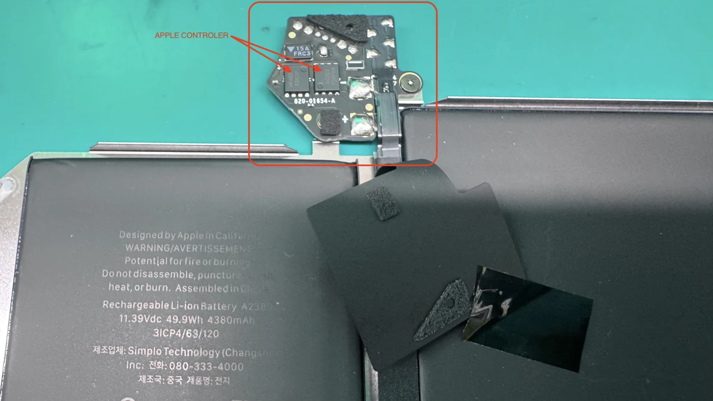 Genuine Apple MacBook battery with the real Apple controller board circled, stamped 820-01654-A