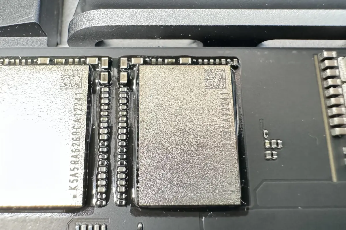 Close-up of SSD chips on Mac Studio logic board during data recovery repair at WarriorMac Tampa
