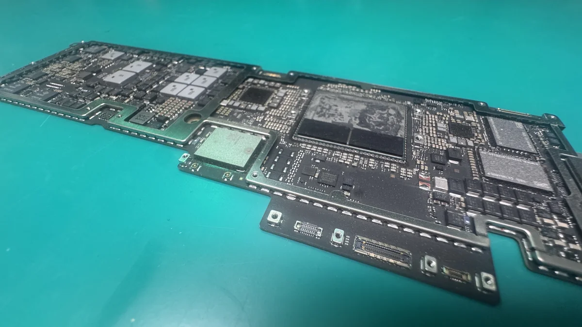MacBook Air M2 logic board on ESD mat at WarriorMac