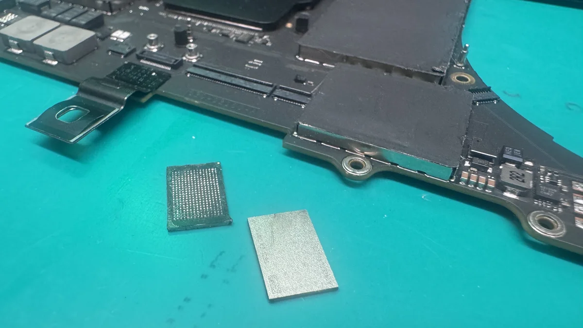 MacBook Pro 16-inch logic board component close-up at WarriorMac