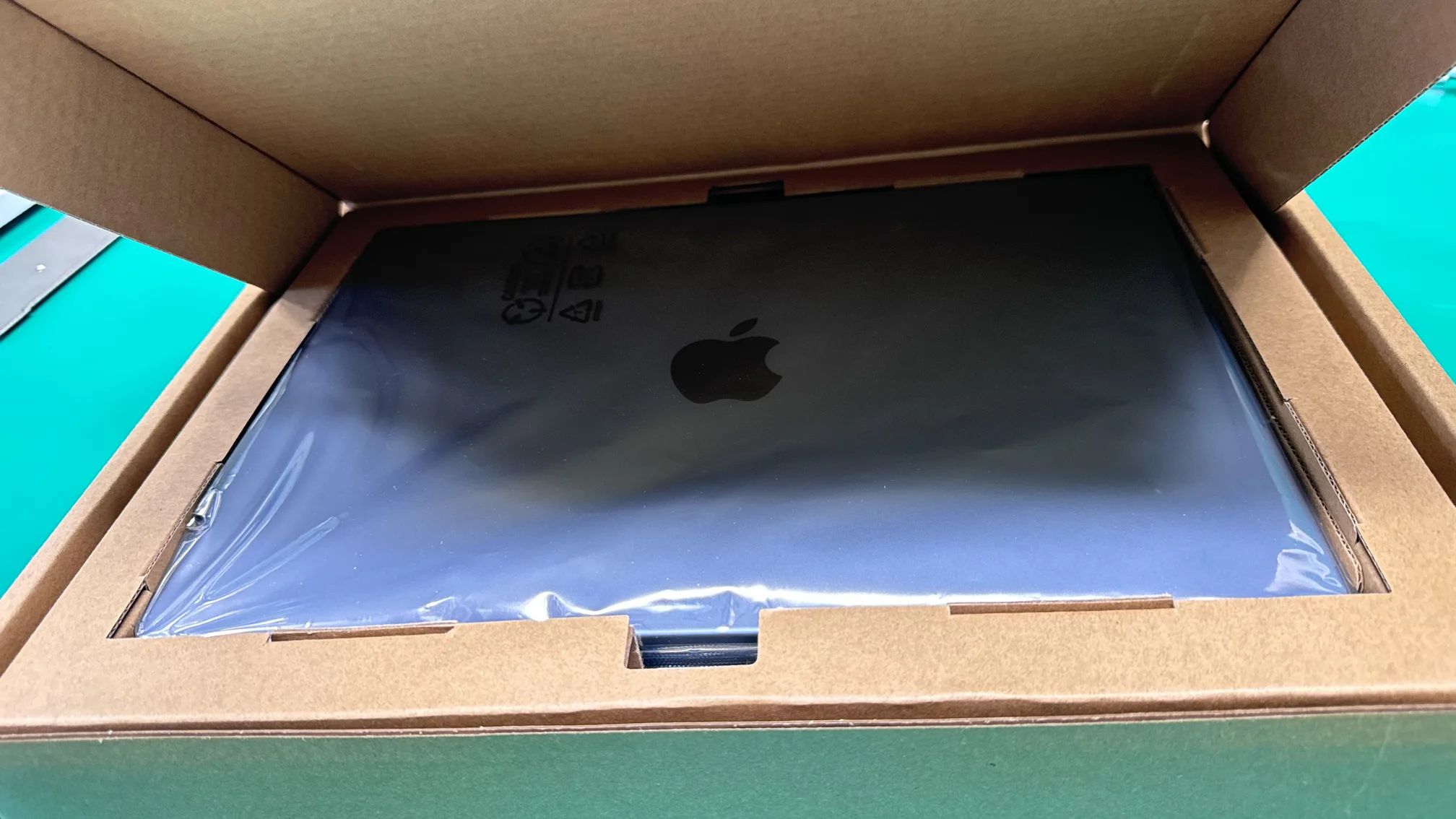 New MacBook Pro Retina display assembly in protective packaging ready for screen replacement at WarriorMac Tampa