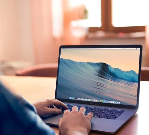 Why choose WarriorMac for MacBook repair in Tampa — open MacBook on desk