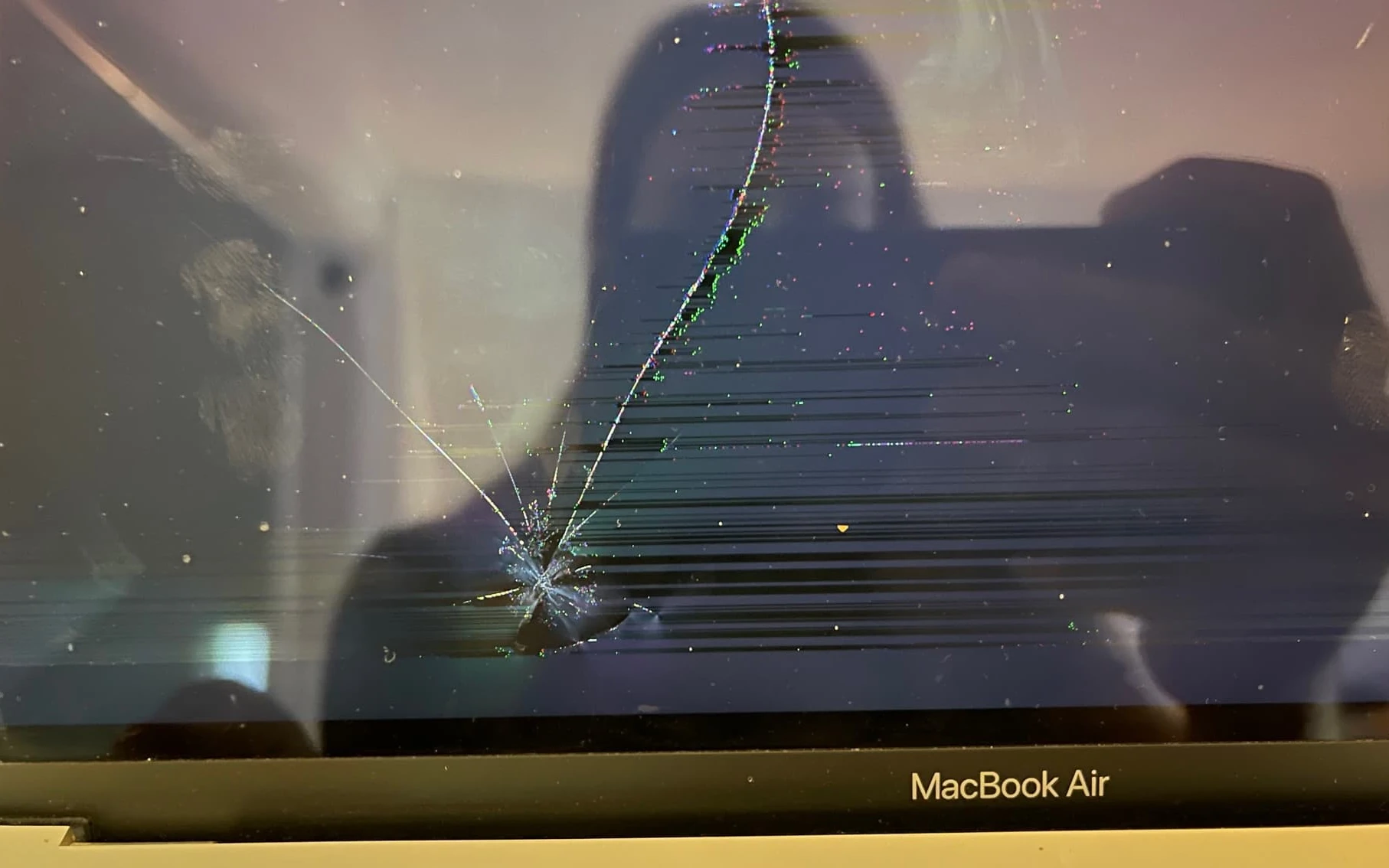 MacBook with cracked LCD screen needing repair